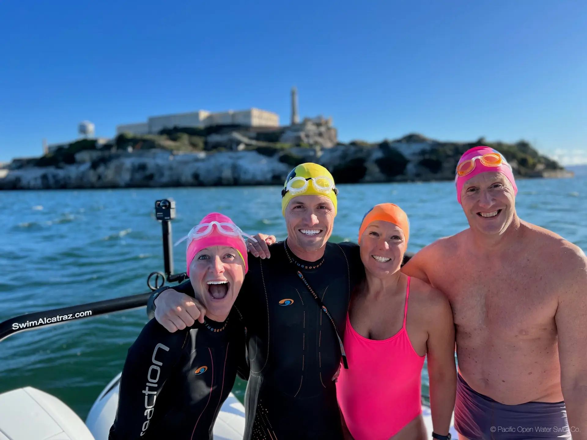 Alcatraz swimmers on a clear day ready to jump and escape to SF